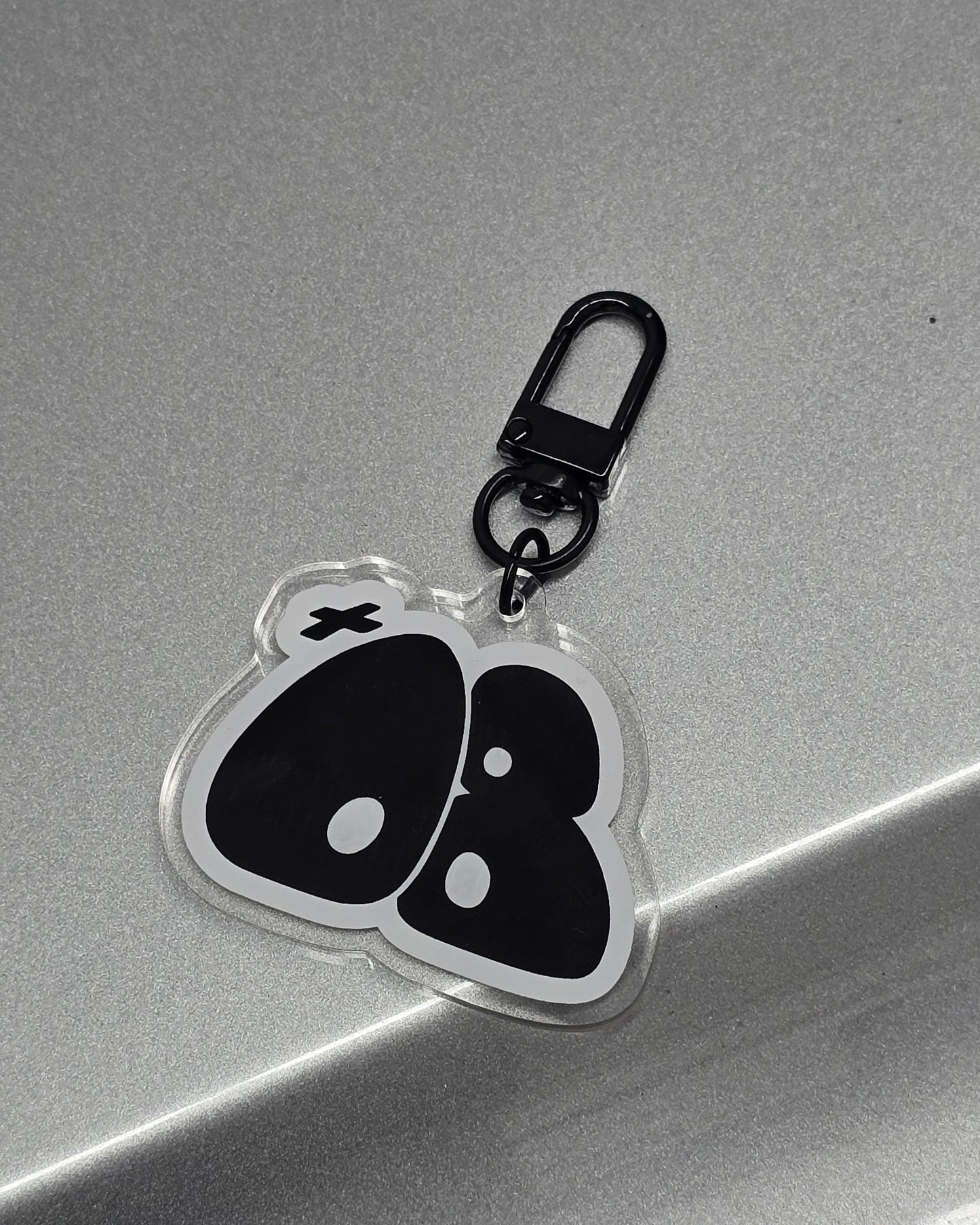 "+08" Bubble Logo Key Chain