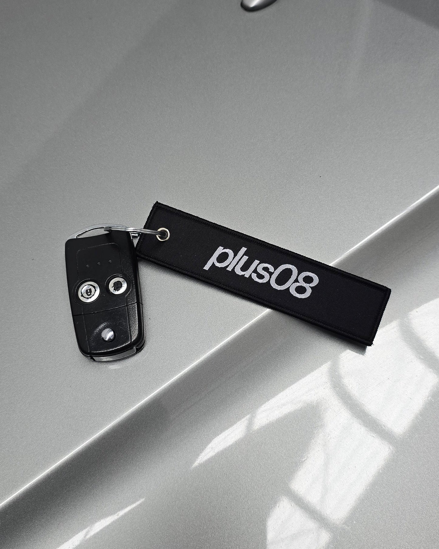 plus08 Jet Tag Keychain