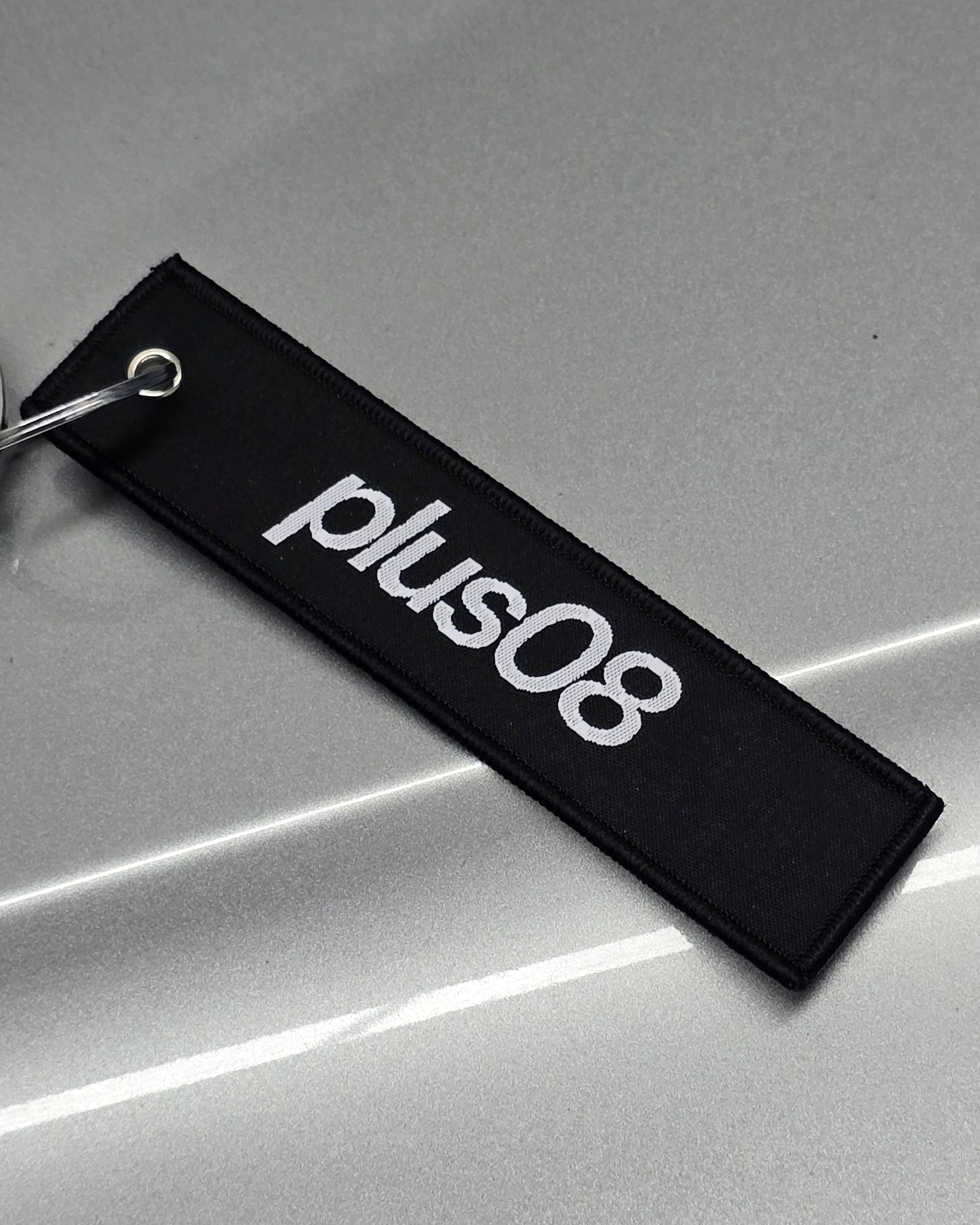 plus08 Jet Tag Keychain