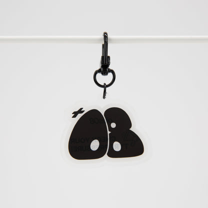 Black keychain with a design on a white background